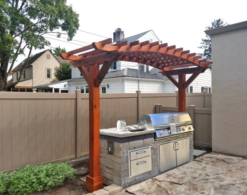 Two-Post Arched Wood Arbor (CUSTOM OPTIONS: 12' x 4', California Redwood, 6" x 6" Posts and 2" x 6" Roof Timbers, 9ft H, Add Oversize Arbor Kit, No Privacy Panel, Transparent Premium Sealant). Photo Courtesy of J. Lyons of Columbus, CA. Two-Post Arched Wood Arbor (CUSTOM OPTIONS: 12' x 4', California Redwood, 6" x 6" Posts and 2" x 6" Roof Timbers, 9ft H, Add Oversize Arbor Kit, No Privacy Panel, Transparent Premium Sealant). Photo Courtesy of J. Lyons of Columbus, CA.