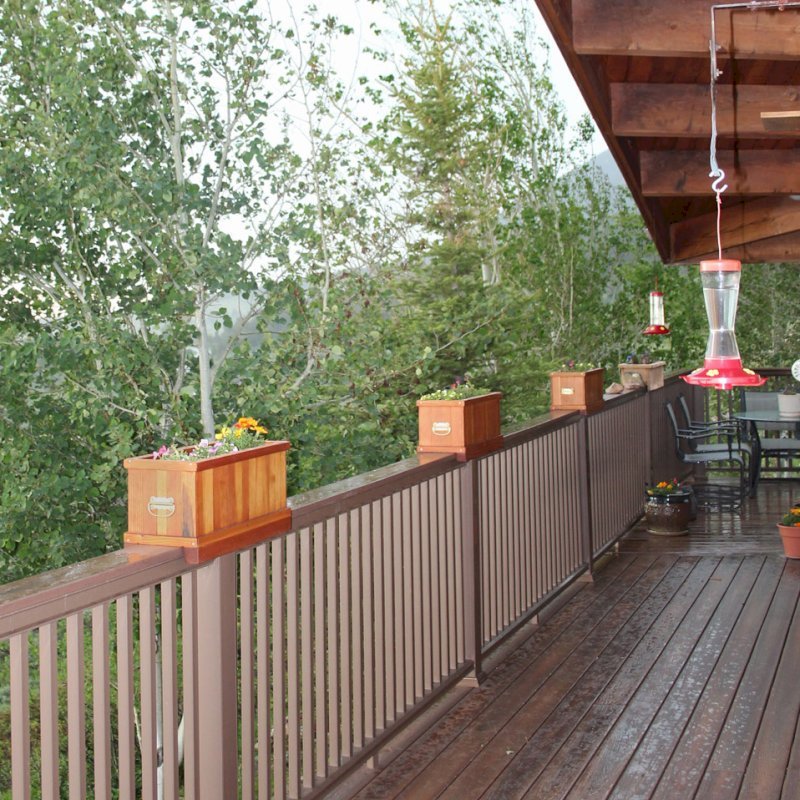 Window Box Planters (Options: 24" L, 9" W, 9" H, Douglas-fir, With Strips for Placement Over Railings, Transprent Premium Sealant). Photo Courtesy of Mr. Paul Ferguson of Casper, Wyoming. Note: Handles on the ends were added by customer. Window Box Planters (Options: 24" L, 9" W, 9" H, Douglas-fir, With Strips for Placement Over Railings, Transprent Premium Sealant). Photo Courtesy of Mr. Paul Ferguson of Casper, Wyoming. Note: Handles on the ends were added by customer.