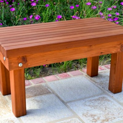 Wood Patio Bench (Options: 2 1/2 ft x 16 inches W x 15 1/2 inches H,Mature Redwood, No Cushion, No Engraving, Transparent Premium Sealant). Photo Courtesy of The Estero Beach Resort, Ensenada, Mexico.