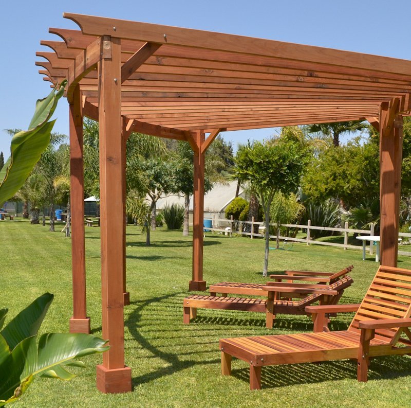 Wood Pool Lounger (Options: Single, Standard 74", Redwood, 13" H, Include Wooden Wheels, Transparent Premium Sealant). La grange style armrests & 54" L bed by custom request. Photo also shows The Fan Pergola Wood Pool Lounger (Options: Single, Standard 74", Redwood, 13" H, Include Wooden Wheels, Transparent Premium Sealant). La grange style armrests & 54" L bed by custom request. Photo also shows The Fan Pergola