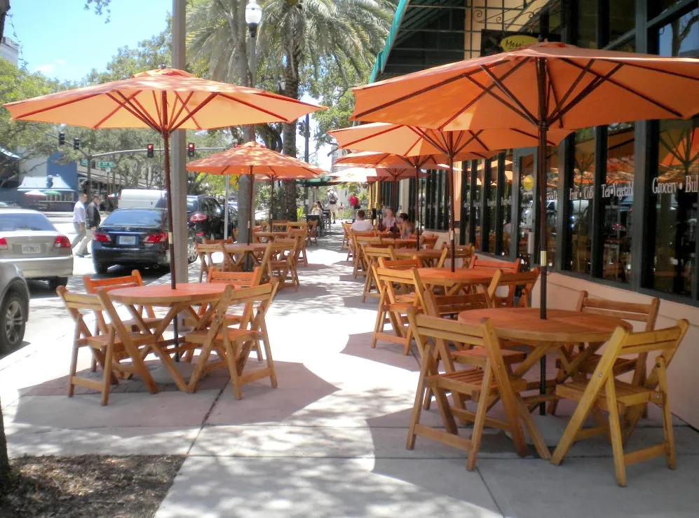 Redwood Folding Table and Chairs in Messineo's Gourmet Market Restaurant