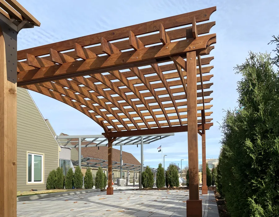Arched Open Sky Pergolas (Options: 16' L x 20' Arc W, Mature Redwood, No Electrical Wiring Trim, 4-Post Anchor Kit for Concrete, No Ceiling Fan Base, No Privacy Panels, No Curtain Rods, 9.5' Post Height, Transparent Premium Sealant). Photo Courtesy of S. Glancy of Gibsonia, PA.