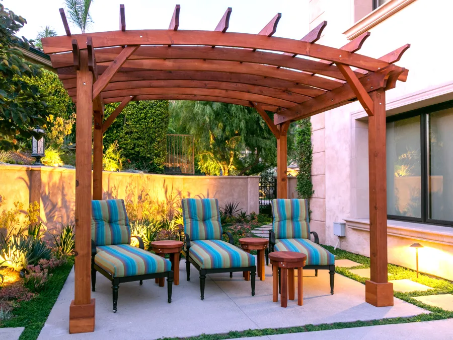 Arched Open Sky PergolaArched Open Sky Pergolas (Options: 11' L x 13' Arc W, Mature Redwood, Unattached, No Electrical Wiring Trim, 4-Post Anchor Kit for Concrete, No Ceiling Fan Base, No Privacy Panels, No Curtain Rods, 9' Post Height, Transparent Premium Sealant). Photo courtesy of G. Gigante of Glendora, CA.