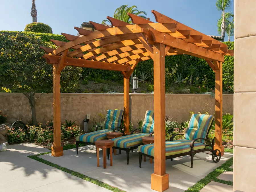 Arched Open Sky PergolaArched Open Sky Pergolas (Options: 11' L x 13' Arc W, Mature Redwood, Unattached, No Electrical Wiring Trim, 4-Post Anchor Kit for Concrete, No Ceiling Fan Base, No Privacy Panels, No Curtain Rods, 9' Post Height, Transparent Premium Sealant). Photo courtesy of G. Gigante of Glendora, CA.