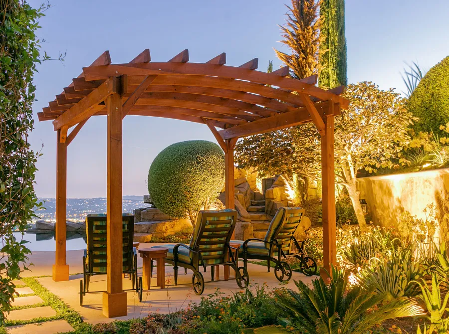 Arched Open Sky PergolaArched Open Sky Pergolas (Options: 11' L x 13' Arc W, Mature Redwood, Unattached, No Electrical Wiring Trim, 4-Post Anchor Kit for Concrete, No Ceiling Fan Base, No Privacy Panels, No Curtain Rods, 9' Post Height, Transparent Premium Sealant). Photo courtesy of G. Gigante of Glendora, CA.