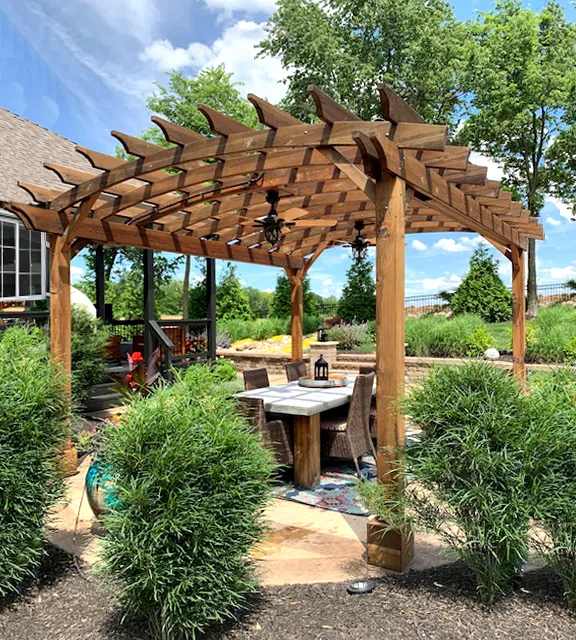 Arched Open Sky Pergolas (Options: 16' L x 14' Arc W, California Redwood, 2 Electrical Wiring Trims, 4-Post Anchor Kit for Concrete, 2 Ceiling Fan Bases, No Privacy Panels, No Curtain Rods, 9' Post Height, Transparent Premium Sealant). Photo Courtesy of J. Buck of Kansas City, Missouri.