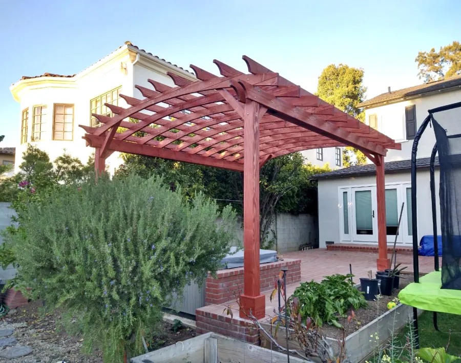 Arched Open Sky Pergolas (Options: 18' L x 15' Arc W, Douglas-fir, 2 Electrical Wiring Trims, 4-Post Anchor Kit for Concrete, No Ceiling Fan Base, No Privacy Panels, No Curtain Rods, 9' Post Height, Custom Stain). Photo Courtesy of K. Jefferson of Santa Monica, CA.