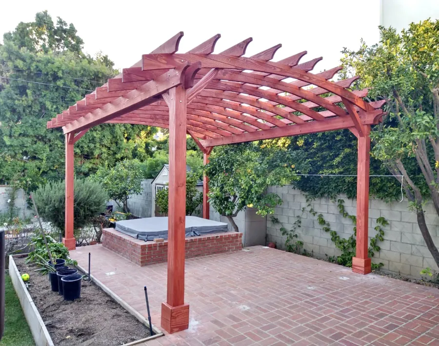 Arched Open Sky Pergolas (Options: 18' L x 15' Arc W, Douglas-fir, 2 Electrical Wiring Trims, 4-Post Anchor Kit for Concrete, No Ceiling Fan Base, No Privacy Panels, No Curtain Rods, 9' Post Height, Custom Stain). Photo Courtesy of K. Jefferson of Santa Monica, CA.