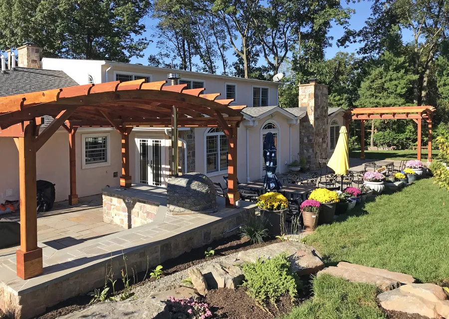 Arched Open Sky Pergolas (Options: 14' L x 12 Arc W & 24' L x 15' W, California Redwood, No Electrical Wiring Trim, No Decorative Trims on Posts, 4-Post Anchor Kit for Concrete, No Ceiling Fan Base, No Privacy Panels, No Curtain Rods, 9.5' Post Height, Transparent Premium Sealant). Photo Courtesy of M. Burke of BukleSomerset, NJ.