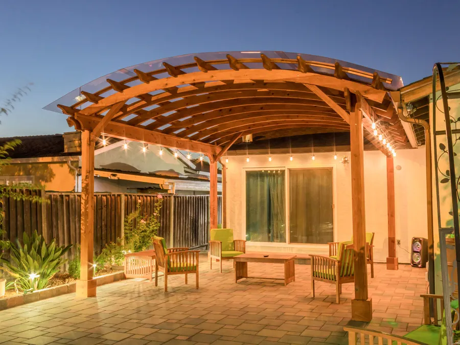 Arched Open Sky Pergolas (Options: 18' L x 16' Arc W, California Redwood, with Rain Guard, Electrical Wiring Trim for All Posts, 4-Post Anchor Kit for Concrete, No Ceiling Fan Base, No Privacy Panels, No Curtain Rods, 9.5' Post Height, Transparent Premium Sealant).