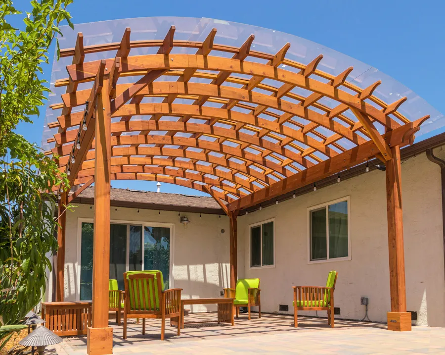 Arched Open Sky Pergolas (Options: 18' L x 16' Arc W, California Redwood, with Rain Guard, Electrical Wiring Trim for All Posts, 4-Post Anchor Kit for Concrete, No Ceiling Fan Base, No Privacy Panels, No Curtain Rods, 9.5' Post Height, Transparent Premium Sealant).
