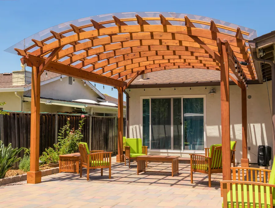 Arched Open Sky Pergolas (Options: 18' L x 16' Arc W, California Redwood, with Rain Guard, Electrical Wiring Trim for All Posts, 4-Post Anchor Kit for Concrete, No Ceiling Fan Base, No Privacy Panels, No Curtain Rods, 9.5' Post Height, Transparent Premium Sealant).