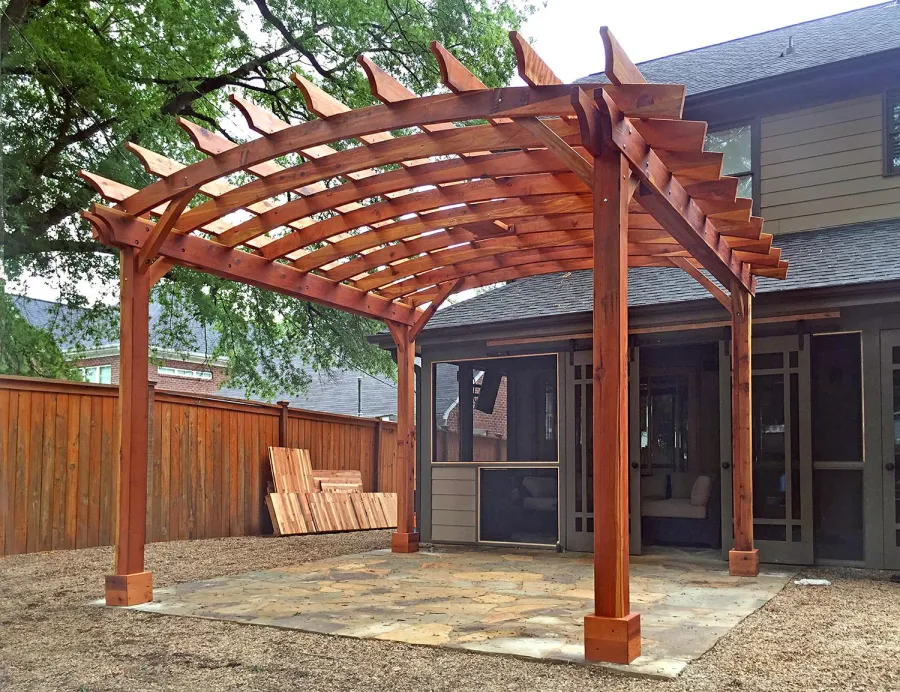 Arched Open Sky Pergolas (Options: 16' L x 12' Arc W, California Redwood, No Electrical Wiring Trim, Arched Roof with Lattice Panels, 4-Post Anchor Kit for Wood, No Ceiling Fan Base, with No Privacy Panels, No Curtain Rods, Transparent Premium Sealant). Photo Courtesy of B. McPherson of Billings, MT.