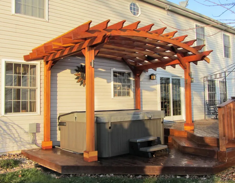 Arched Open Sky Pergolas (Options: 10' L  x 14' Arc W, California Redwood, Unattached, No Electrical Wiring Trim, Arched Roof without Lattice Panels, 4-Post Anchor Kit for Wood, No Ceiling Fan Base, No Privacy Panels, No Curtain Rods, 9'  Post Height [custom length for 2 posts], Transparent Premium Sealant). Photo Courtesy of Doug K. of Erie, Michigan.