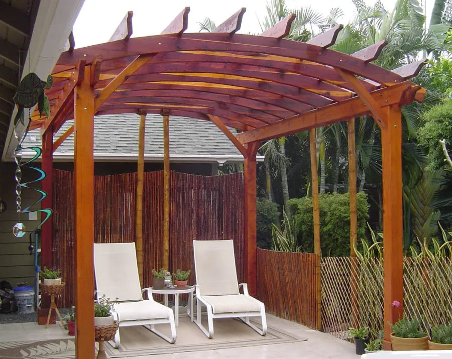 Arched Open Sky Pergolas (Options: 14' L x 12' Arc W, California Redwood, Unattached, No Electrical Wiring Trim, Arched Roof without Lattice Panels, 4-Post Anchor Kit for Stone, No Ceiling Fan Base, No Privacy Panels, No Curtain Rods, 9' Post Height, Transparent Premium Sealant). Photo courtesy of Jeff Bigler of Wailuku, HI.