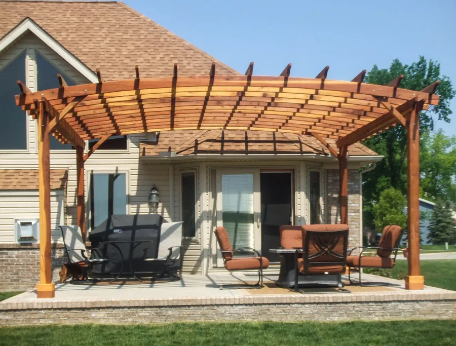 Arched Open Sky Pergolas (Options: 20' L x 18' Arc W, California Redwood, Unattached, No Electrical Wiring Trim, Arched Roof without Lattice Panels, 4-Post Anchor Kit for Stone, No Ceiling Fan Base, No Privacy Panels, No Curtain Rods, 9.5' Post Height, Transparent Premium Sealant). Photo Courtesy of David Gordon of Newport, Michigan. 