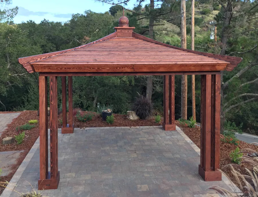 Asian Fusion Pavilion (Options: 18 ft L x 18 ft W, Douglas-fir, 4-Traditional Asian Fusion Anchoring Set, No Electrical Wiring Trim, 10 ft H, No Ceiling Fan, No Privacy Panels, No Curtain Rods, Coffee-Stain Premium Sealant). Photo Courtesy of M. Chadha of Saratoga, CA.