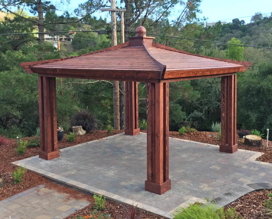 Asian Fusion Pavilion (Options: 18 ft L x 18 ft W, Douglas-fir, 4-Traditional Asian Fusion Anchoring Set, No Electrical Wiring Trim, 10 ft H, No Ceiling Fan, No Privacy Panels, No Curtain Rods, Coffee-Stain Premium Sealant). Photo Courtesy of M. Chadha of Saratoga, CA.