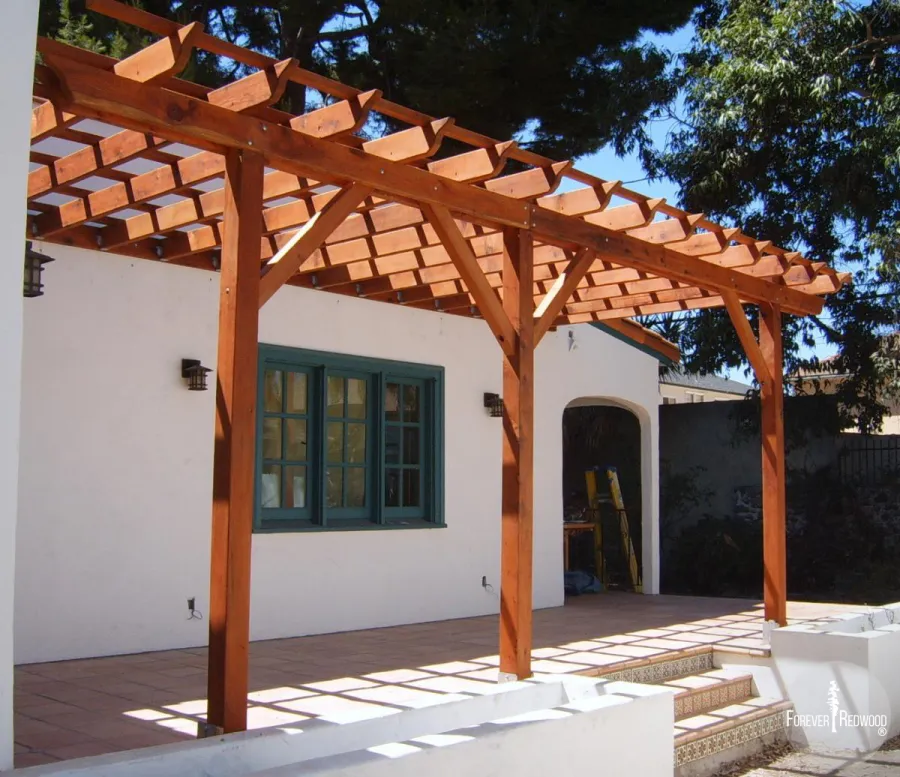 Attached Garden Pergolas (Options: 22' L x 10' W, Attached to Wall by Support Side, Mature Redwood, No Electrical Wiring Trim, Open Roof with Slats at 18", 3-Post Anchor Kit for Concrete, Transparent Premium Sealant).