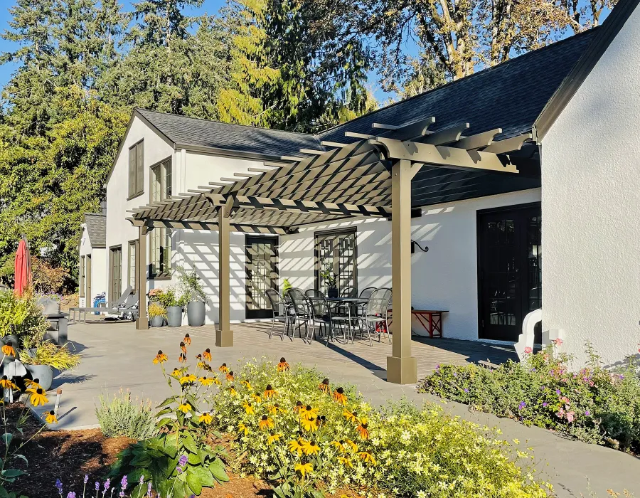 Attached Garden Pergola (Options: 32' x 14', California Redwood, Open Roof with Slats at 18", Rafters at 18", 3-Post Anchor Kit for Concrete, No Ceiling Fan Base, Gray Oil-Based Primer [Paint Applied by Customer]). Photo Courtesy of T. Elliott of Portland, Oregon.