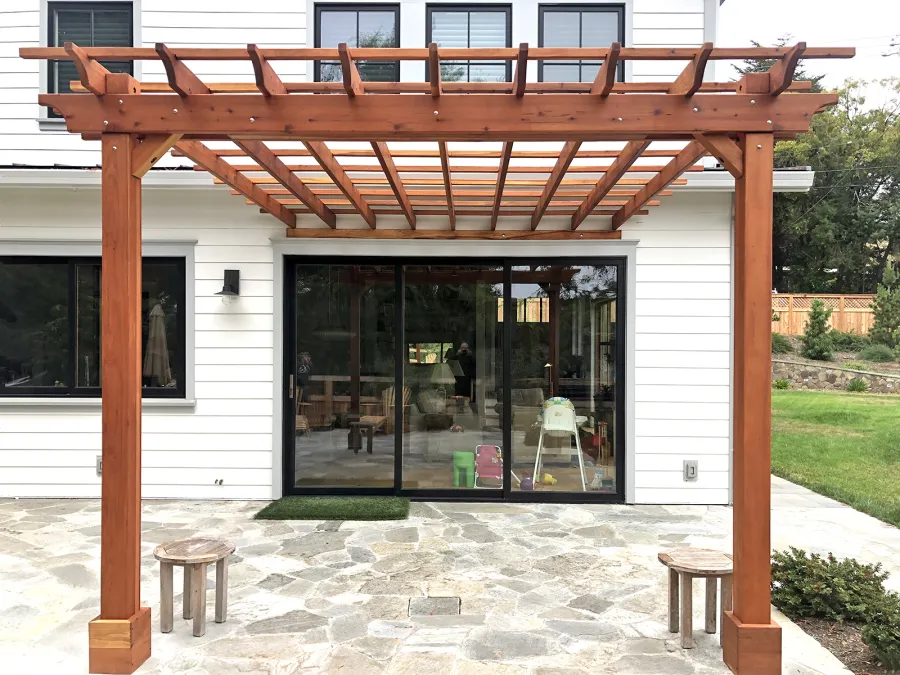 Attached Garden Pergola (Options: 14' x 13', California Redwood, Open Roof with Slats at 18", Rafters at 18", 2-Post Anchor Kit for Concrete, No Ceiling Fan Base, Transparent Premium Sealant). Photo Courtesy of B. Tewksbury of Mill Valley, California.