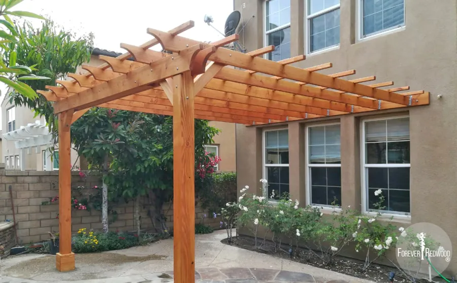 Attached Garden Pergolas (Options: 14' L x 15' W, Attached to Wall by Rafters Side, Douglas-fir, No Electrical Wiring Trim, 2-Post Anchor Kit for High-Wind, Open Roof with Slats at 18", Rafters at 18", No Post Decorative Trims, Transparent Premium Sealant). Photo Courtesy of H. Shang of Irvine, California.