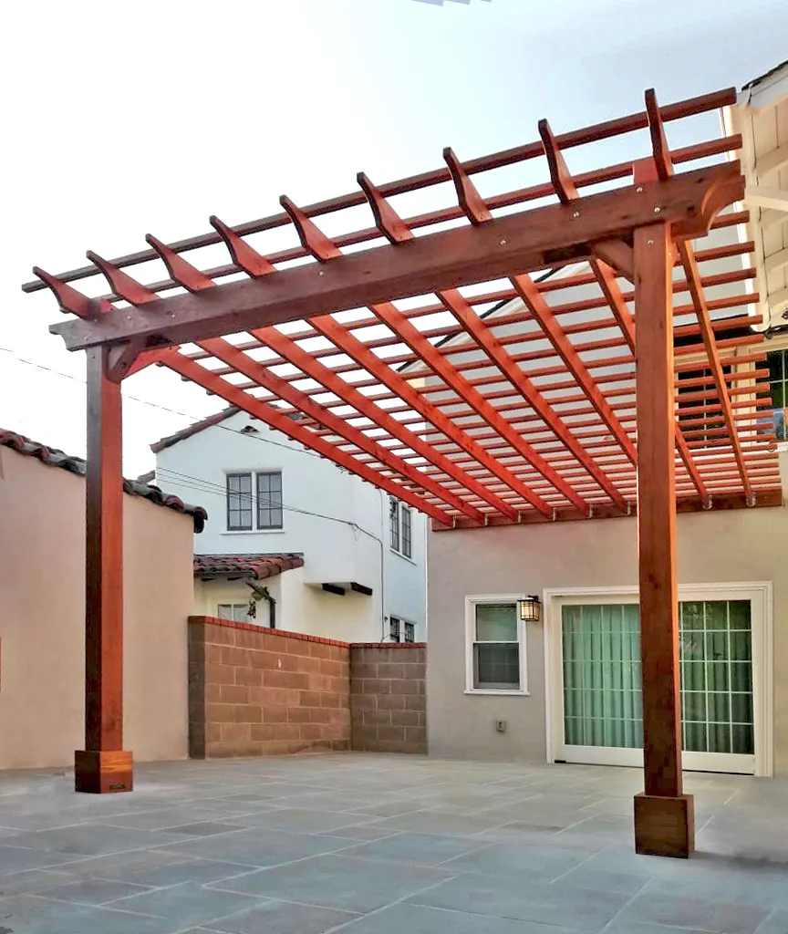 Attached Garden Pergola (Options: 13'-6" x 16'-6", Mature Redwood, Open Roof with Slats at 6", Rafters at 18", 2-Post Anchor Kit for Concrete, No Ceiling Fan Base, Transparent Premium Sealant). Photo Courtesy of J. Mason of Alameda, California.