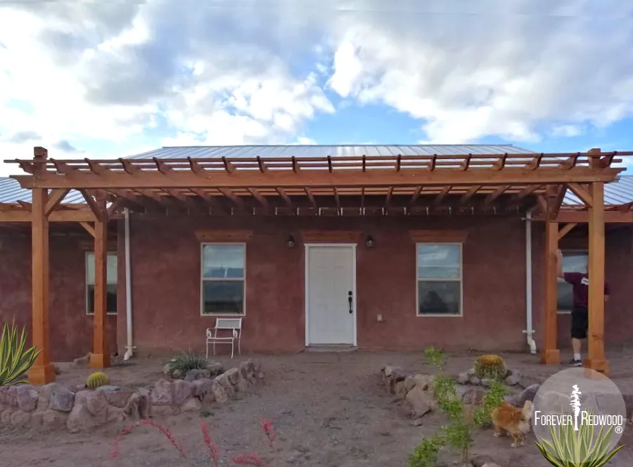 Attached Garden Pergolas (Options: 25' L x 12' W & 25' L x 7' W , Attached to Wall by Support Side, Douglas-fir, No Electrical Wiring Trim, Post Anchor Kit for High-Wind, Open Roof with Slats at 18", Rafters at 18", No Post Decorative Trims, Transparent Premium Sealant). Photo Courtesy of N. Miller of Las Cruces, New Mexico.