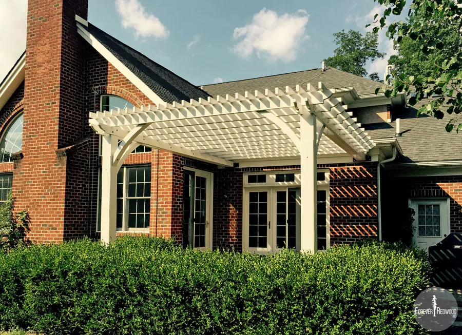 Attached Garden Pergolas (Options: 14' L x 14' W, California Redwood, No Electrical Wiring Trim, 2-Post Anchor Kit for High-Wind, Open Roof with Slats at 6", Rafters at 18", 2x4's Slats and 2x8's Rafters by Custom Request, No Post Decorative Trims, Custom Paint). Photo Courtesy of Walt and Mayra Talunas of West Chester, Pennsylvania.