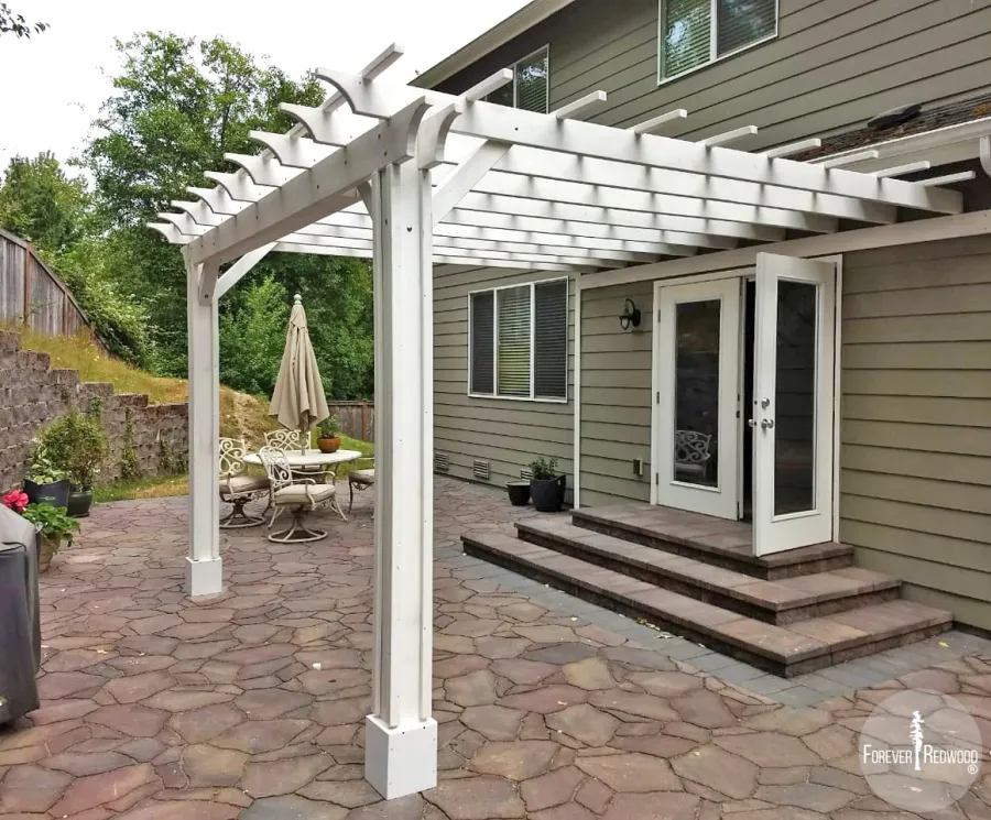 Attached Garden Pergolas (Options: 14' x 14', Attached to Wall by Supports Side, Douglas-fir, Electrical Wiring Trim for 2 Posts, Open Roof with Slats at 18", Vertical Decorative Trims on Posts, Off-White Oil-Based Primer).