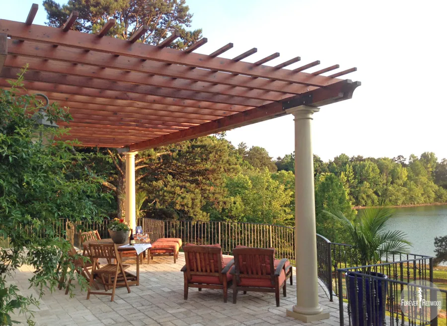 Attached Garden Pergolas (Options: 30' L x 14' W, Mature Redwood, No Electrical Wiring Trim, Open Roof with Slats at 12", Posts Wrapped with Columns After Installation, Transparent Premium Sealant). Photo Courtesy of Casey Graybeal of Gainesville, Georgia.