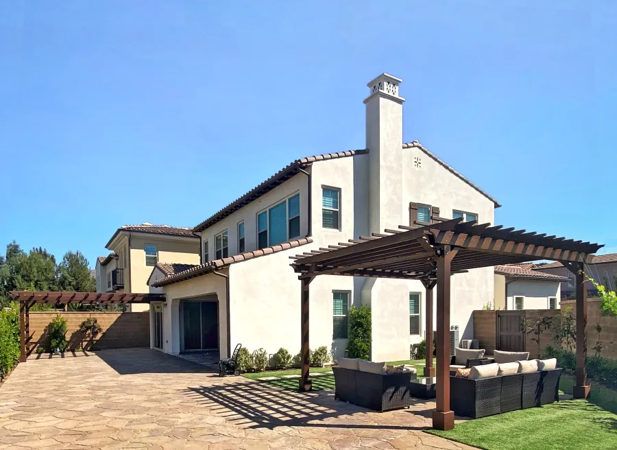 Attached Garden Pergolas (Options: 20' x 16', Douglas-fir, Open Roof with Slats at 18", Rafters at 18", 2-Post Anchor Kit for Concrete, 1 Ceiling Fan Base, Custom Paint). Photo Also Shows a Traditional Garden Pergola. Photo Courtesy of M. Ibrahim Elfar of Irvine, California.