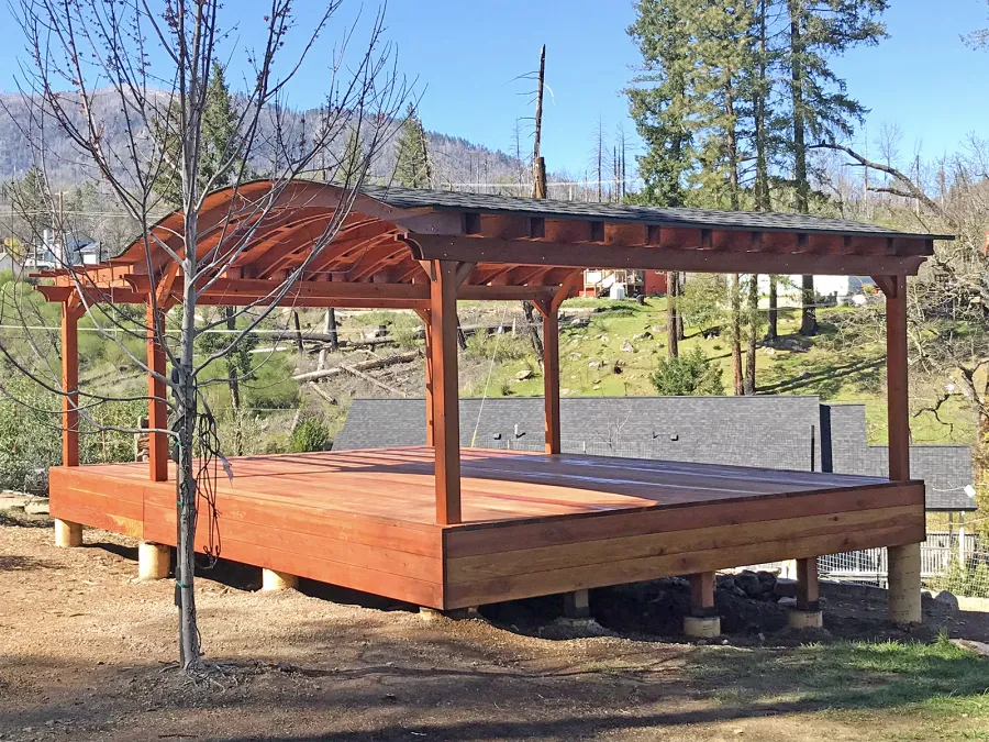 Backyard Pavilion Kits (Options: 20' L x 20' Arc W, California Redwood, 6-Post Anchor Kit for Concrete, No Ceiling Fan Base, No Privacy Panels, No Curtain Rods, 9 ft Post Height, Transparent Premium Sealant) with 10' x 20' Garden Pergola Attached and Custom Deck. Photo Courtesy J. Yurkevich of Middletown, CA.