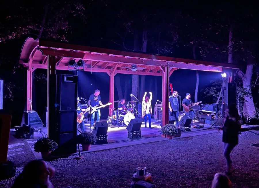 Highway 615 Band Playing Under our Backyard Pavilion (Options: 30' x 18', California Redwood, 2 Electrical Wiring Trim Kits, 6-Post Anchor Kit for High-Wind, 2 Ceiling Fan Bases, No Privacy Panels, 2 Fascia Boards, No Curtain Rods, Vertical Decorative Trims for All Posts, 10 ft Post Height, Transparent Premium Sealant). Photo Courtesy of T. Kowa of Oakley, Illinois.