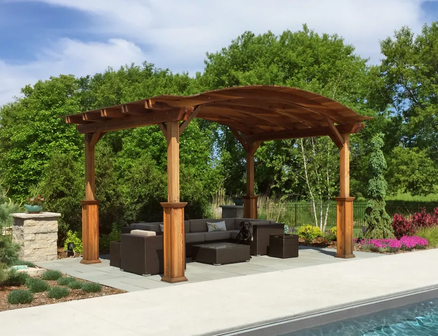 Backyard Pavilion Kits (Options: 16'-6" x 12'-6", California Redwood, 1 Electrical Wiring Trim Kit, 4-Post Anchor Kit for Concrete, No Ceiling Fan Base, No Privacy Panels, No Curtain Rods, 9.5 ft Post Height with Custom Bottom Trims, Transparent Premium Sealant). Photo Courtesy of A. Metzger of Lake Elmo, Minnesota.