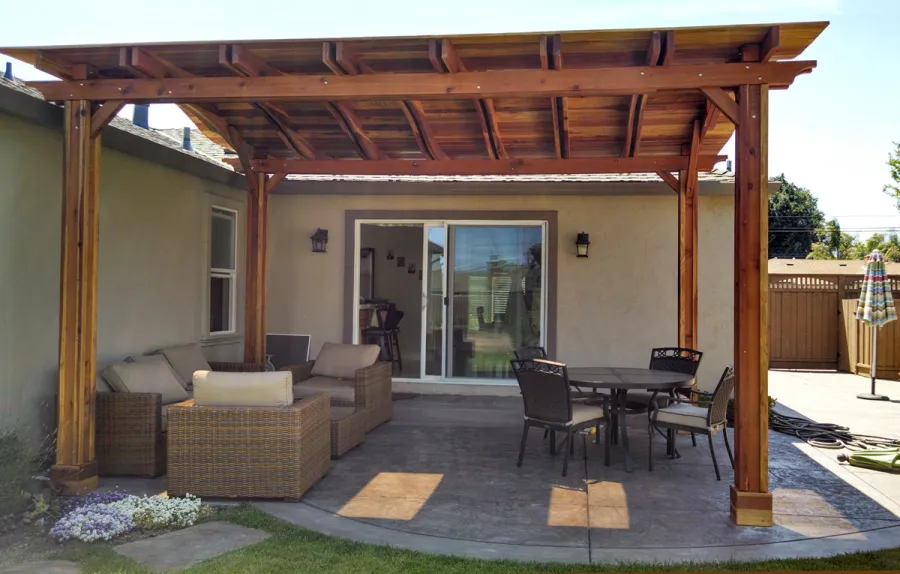 Backyard Pavilion Kits (Options: 18' x 15', California Redwood, No Electrical Wiring Trim, 4-Post Anchor Kit for Stone, No Ceiling Fan Base, No Privacy Panels, No Curtain Rods, 9.5 ft Post Height, Transparent Premium Sealant). Note: Skylights are custom add-on we can do for any size Pavilion roof..