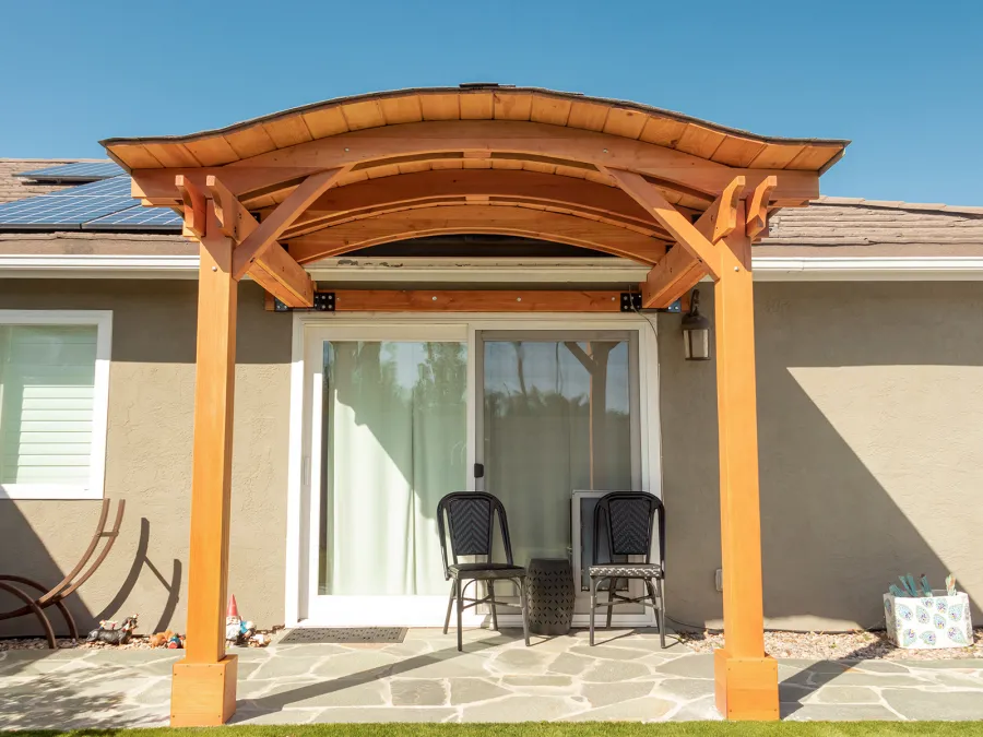 Backyard Porch Pavilion (Options: 8 'L x 10' W, Douglas-fir, 2-Post Anchor Kit for Concrete, No Electrical Wiring Trim, 8 ft Post Height, No Ceiling Fan Base, No Curtain Rods, No Privacy Panels, Transparent Premium Sealant). Photo Courtesy J. Clark of San Diego, CA.