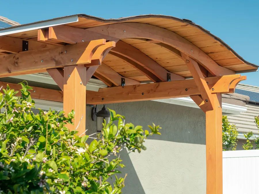 Backyard Porch Pavilion (Options: 8 'L x 10' W, Douglas-fir, 2-Post Anchor Kit for Concrete, No Electrical Wiring Trim, 8 ft Post Height, No Ceiling Fan Base, No Curtain Rods, No Privacy Panels, Transparent Premium Sealant). Photo Courtesy J. Clark of San Diego, CA.