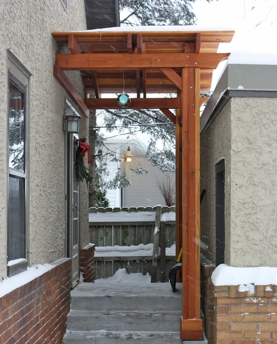 Backyard Porch Pavilion (Options: 6'L x 10'W, California Redwood, 2-Post Anchor Kit for Concrete, No Electrical Wiring Trim, 10ft Post Height, No Ceiling Fan Base, No Curtain Rods, No Privacy Panels, Transparent Premium Sealant). Photo Courtesy of John E. of Maplewood, Minnesota.