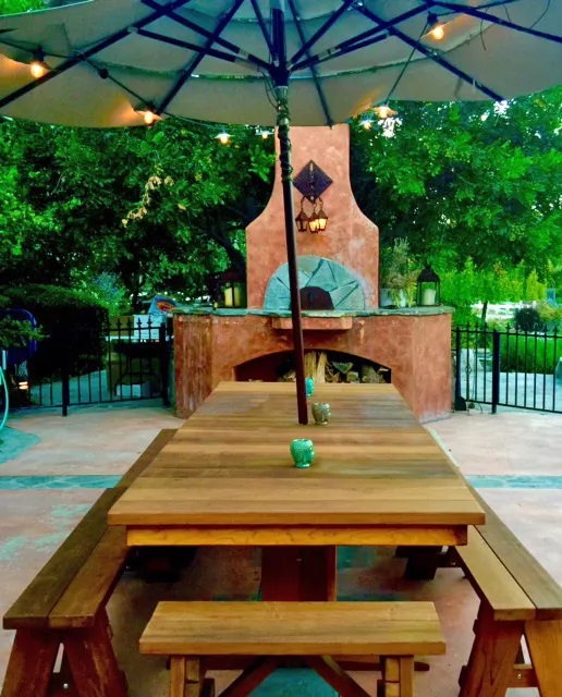 Baja Outdoor Redwood Dining Table (Options: 10 ft L, 48 inches W, Side & End Benches, 2 Half Benches Per Side, California Redwood, Standard Tabletop, Squared Corners, 2" Umbrella Hole, Transparent Premium Sealant). Photo Courtesy of Arjun Reyes of Santa Rosa Valley, CA.