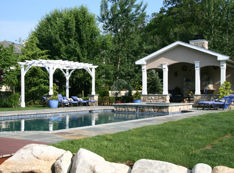 Cherry Hill Outdoor Pergola Kit(Options: 16' x 10', California Redwood, No Electrical Wiring Trim, 4-Post Anchor Kit for Stone, Brick or Concrete, No Ceiling Fan Base, No Curtain Rods, No Privacy Panels, 9' Post Height, Off-White Oil-Based). Photo Courtesy of Rich Wulwick of Cherry Hill, New Jersey.