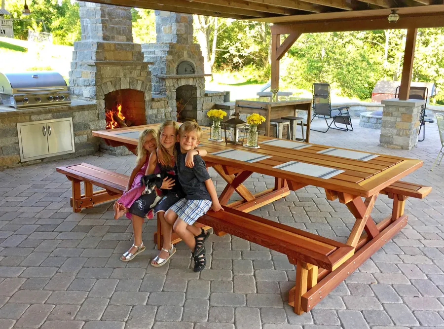 Chris's Picnic Table (Attached Benches) (Options: 10' L x 46" W, California Redwood, Standard Tabletop, Slightly Rounded Corners, No Umbrella Hole, Transparent Premium Sealant). Photo Courtesy of Marie P. of Cincinnati, OH.