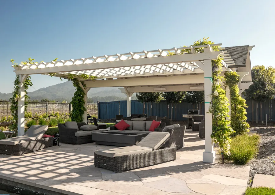 Custom Wooden Pergola with Attached Pavilion (Options: 26' L x 12' W, California Redwood, No Electrical Wiring Trim Kit, Post Anchor Kit for High-Wind, Custom White Paint) with a Garden Pergola Attached. Photo Courtesy of M. Hansen of St. Helena, California.