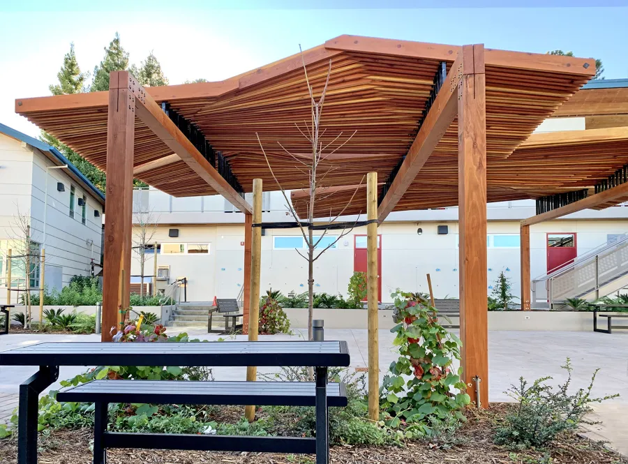 Custom Wooden Pergola (Options: California Redwood, Custom Post Anchor Kit, Transparent Premium Sealant). Installled in The Carey School at 1 Carey School Lane, San Mateo, CA 94403. 
