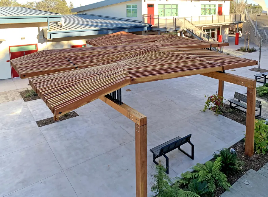 Custom Wooden Pergola (Options: California Redwood, Custom Post Anchor Kit, Transparent Premium Sealant). Installled in The Carey School at 1 Carey School Lane, San Mateo, CA 94403. 