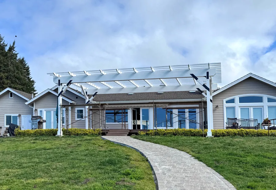 Custom Wooden Pergola (Options: 40' x 19', California Redwood, 12' H Posts, 8x8 Posts, 8x19 Composite Supports, 3x8 Rafters, 3x3 Slats, No Ceiling Fan Base, Posts Anchor Kit for High-Wind, Off-White Oil-Based Primer). Photo Courtesy of J. Adams of Mendocino, CA.