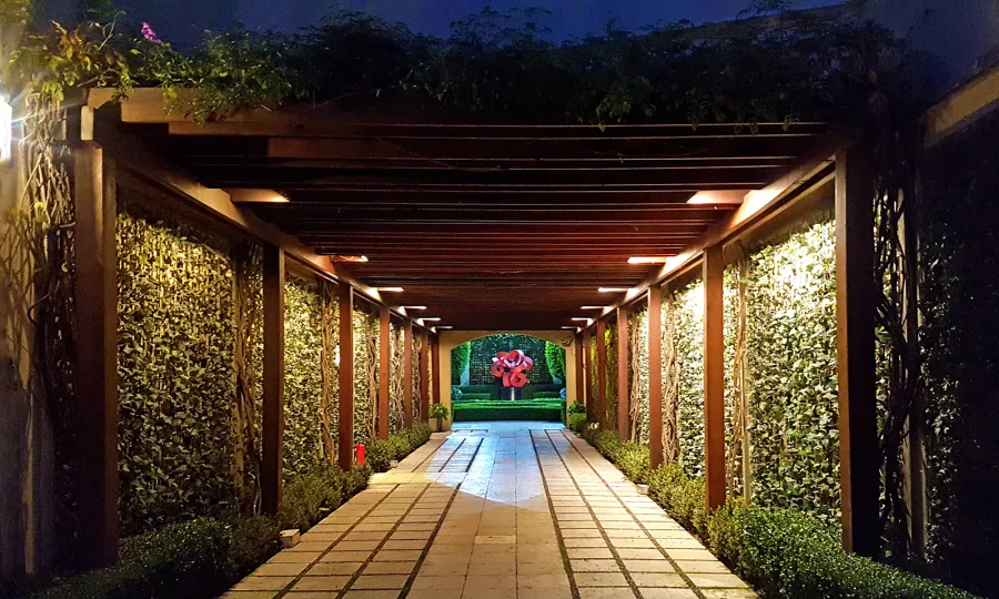 Custom Wooden Pergola (Options: Old-Growth Redwood, Transparent Premium Sealant). Roof for a Museum in Mexico City, Mexico. Photo was taken after 10 years of installation.