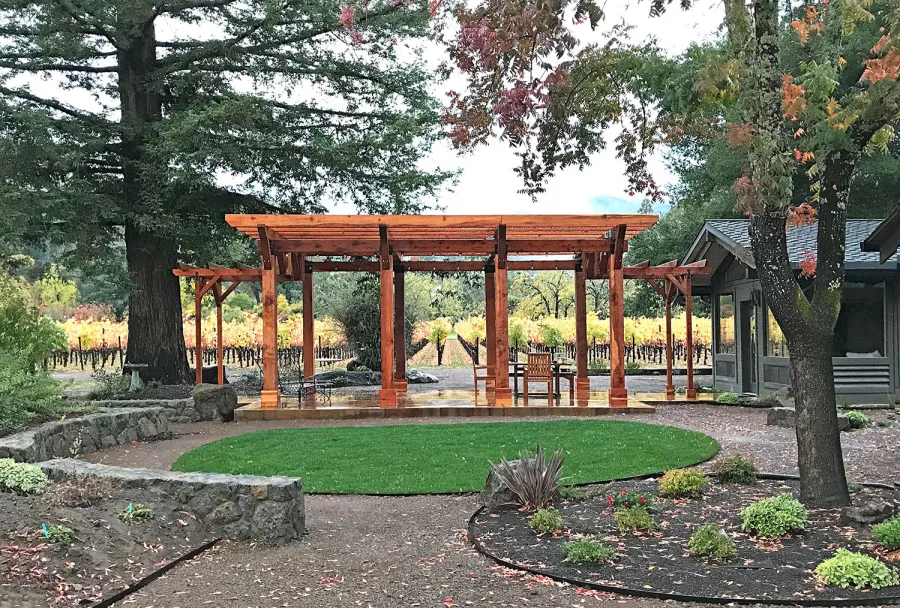 Custom Wooden Pergola (Options: 28' x 20', California Redwood, Posts Anchor Kit for Concrete, Transparent Premium Sealant). Photo Courtesy of S. Taplin of St. Helena, CA.