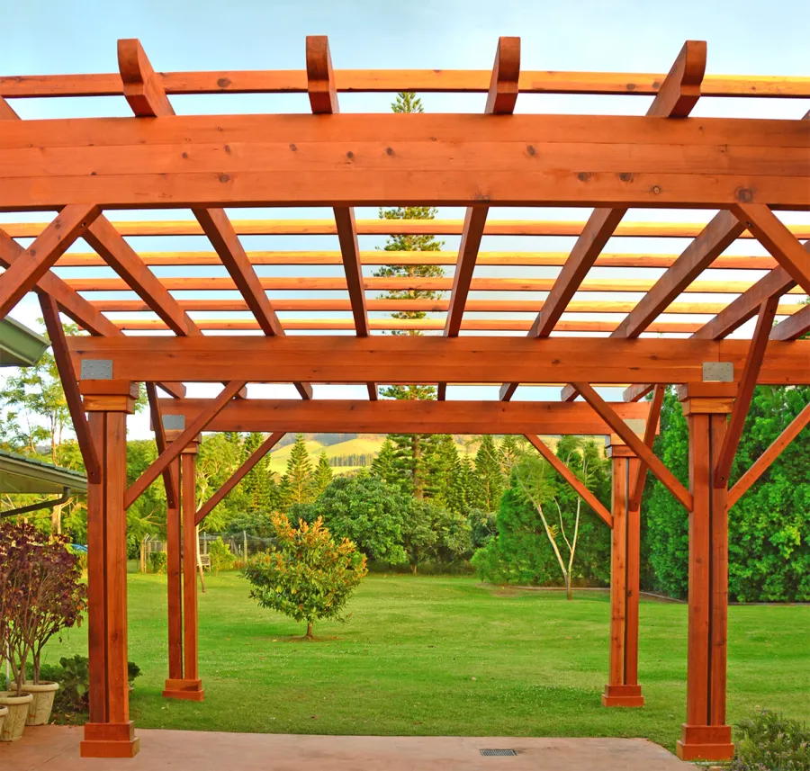 Custom Wooden Pergola (Options: 39' x 50', Mature Redwood, 3 1/8" x 15" Glulam Beams/Supports, 3 3/4" x 7 1/4" Rafters and 1 3/4" x 3 3/4" Slats, Double 5 /12" x 5 1/2" x 10' Posts, Custom Post Anchors, Transparent Premium Sealant). Photo Courtesy of D. Cole of Maui, Hawaii.