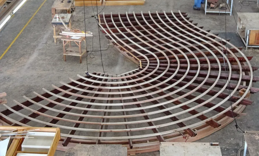 You dream it, we build it: This custom curvy pergola roof was photographed on the shop floor with the slats still unstained. It is a huge, complicated and beautiful project and we decided to post it to the site even unfinished to show it off in case the customer does not get around to sending photos after it is installed! Yes, we can build anything you can imagine if it is made from wood...